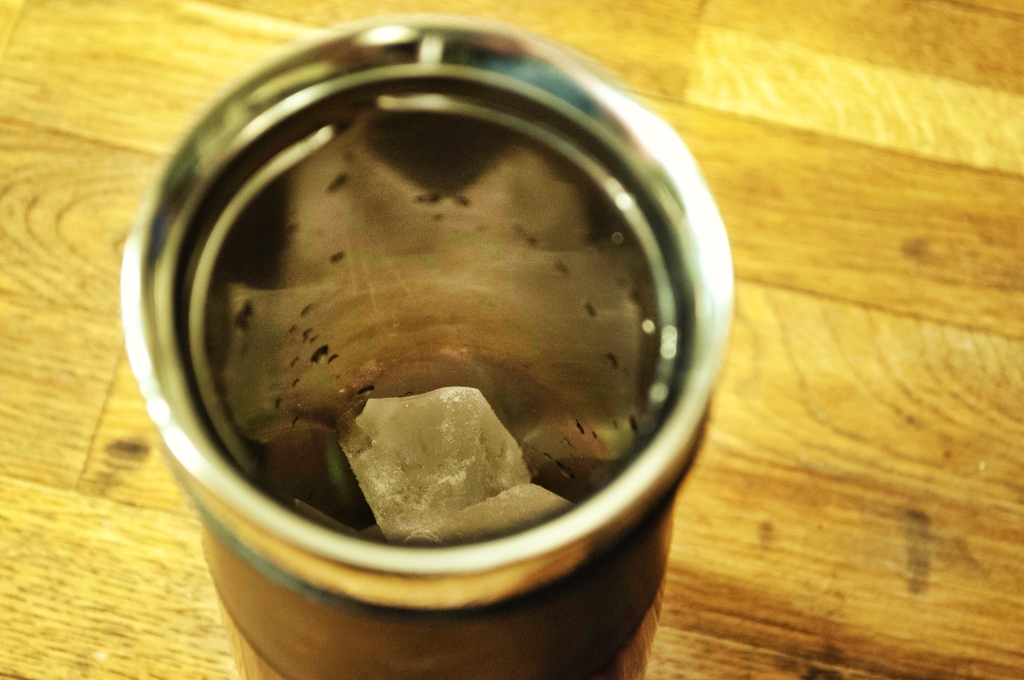 Step one: ice in mug